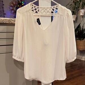 A. Byer Women's Ivory Blouse with Geometric Neckline in Back